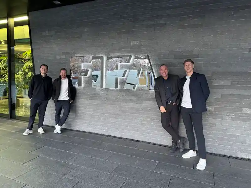 Members of the Sports Labs team outside a facility during an innovation and development visit
