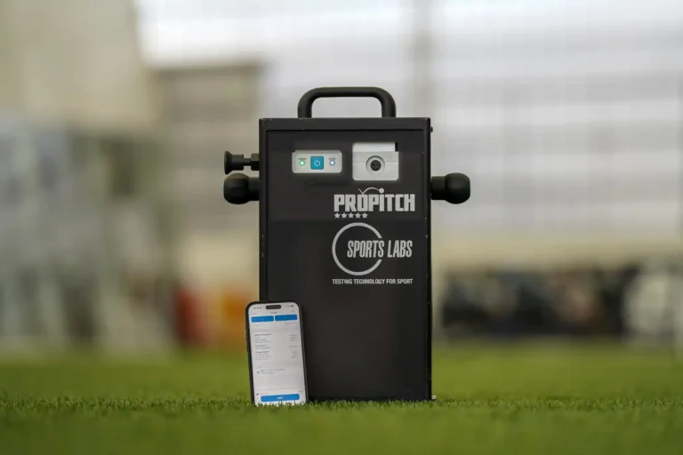 ProPitch Standard Kit travel case beside a phone running the ProPitch app on an indoor pitch